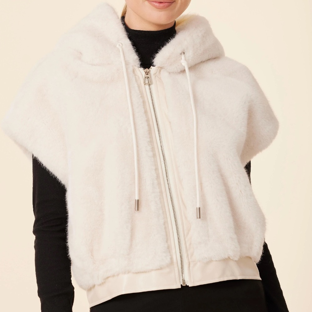 New with tags. Fabulous faux fur vegan leather hooded short sleeve vest jacket